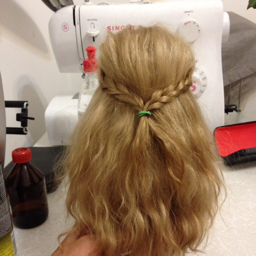 Doll head showing mohair hair